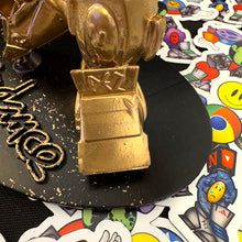 Pezman - Golden Statuette